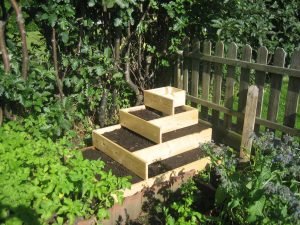 Raised beds make maintenance jobs easier.