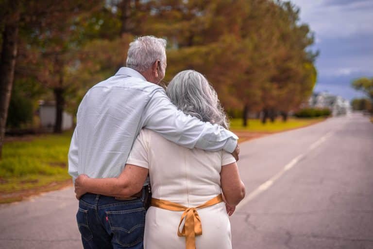 Picture of an elderly couple talking about the mental health resources for Florida's elderly
